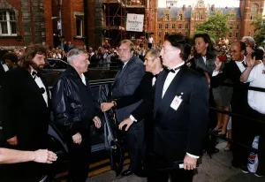 Frank Sinatra Arriving with Bodyguards Mary Kemp people reporter standing on rallings Frank Sinatra Arriving with Bodyguards Mary Kemp people reporter standing on rallings