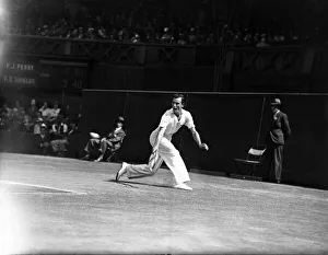 Fred Perry competing at Wimbledon Centre Court, during the final match of The 1934 Davis Fred Perry competing at Wimbledon Centre Court, during the final match of The 1934 Davis