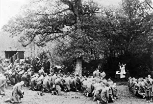 French soldiers hold a mass for their fallen comrades just behind the front line near French soldiers hold a mass for their fallen comrades just behind the front line near