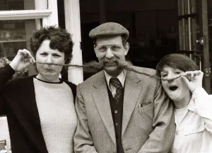 Fruiterer John Edwards of Wrexham North Wales with assistant Ann Owen customer Mary Kyne Fruiterer John Edwards of Wrexham North Wales with assistant Ann Owen customer Mary Kyne