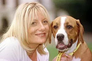 Images Dated 25th August 1999: Gabby Roslin TV Presenter with a stray dog, August 1999 Timmy a boxer cross