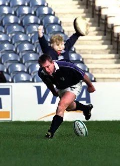 Gary Armstrong of Scotland scoring a try October 1999 against Uruguay in rugby World Cup Gary Armstrong of Scotland scoring a try October 1999 against Uruguay in rugby World Cup