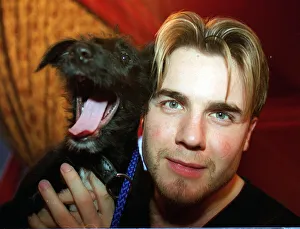 Gary Barlow with puppy Rocky, March 1998. Won by Fariha Ali as part of an Atlantic Gary Barlow with puppy Rocky, March 1998. Won by Fariha Ali as part of an Atlantic