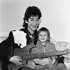 Gary Holton, Actor and son Red, pictured together at home in London, December 1984 Gary Holton, Actor and son Red, pictured together at home in London, December 1984