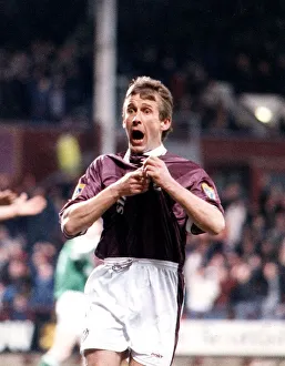 Gary Mackay Hearts football pulling jersey celebrating goal Hearts Hibs Hibernian Gary Mackay Hearts football pulling jersey celebrating goal Hearts Hibs Hibernian