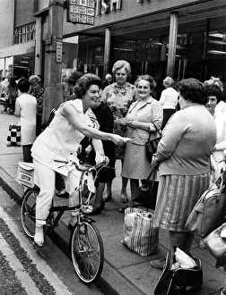 General Election 1970: The Candidate on a Bike. The housewives in the High Street at General Election 1970: The Candidate on a Bike. The housewives in the High Street at