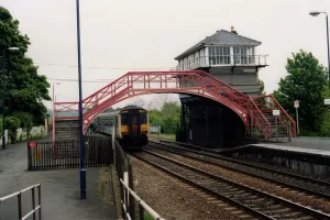 A general view of the signal box and footbridge at Haltwhistle Station on 31st May, 1994 A general view of the signal box and footbridge at Haltwhistle Station on 31st May, 1994