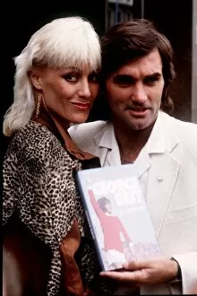Images Dated 1st March 1982: George Best and Angela Best with his book March 1982