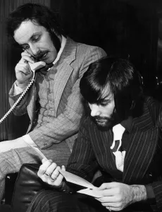 George Best and his business partner Malcolm Mooney working at Best's home George Best and his business partner Malcolm Mooney working at Best's home