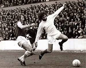 George Best Football Player - April 1971 is tackled by Billy Bond of West Ham George Best Football Player - April 1971 is tackled by Billy Bond of West Ham