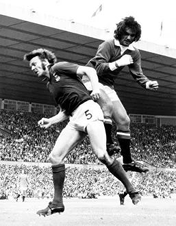 George Best of Manchester United jumps for the ball Aug 1972 against Alan Hunter of George Best of Manchester United jumps for the ball Aug 1972 against Alan Hunter of