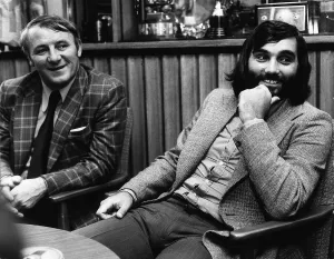 George Best Tommy Docherty both ex footballers sitting talking March 1974 George Best Tommy Docherty both ex footballers sitting talking March 1974