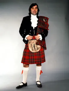 George Best wearing a kilt after signing for Hibernian. 24th November 1979 George Best wearing a kilt after signing for Hibernian. 24th November 1979