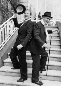 George Cole and Dennis Waterman at Minder photocall dancing on steps 04/12/1988 George Cole and Dennis Waterman at Minder photocall dancing on steps 04/12/1988