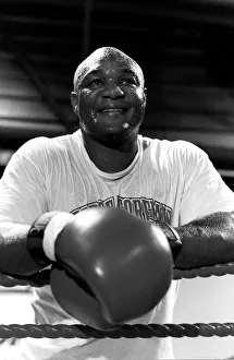 George Foreman Boxer In ring Leaning on ropes Dbase George Foreman Boxer In ring Leaning on ropes Dbase
