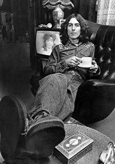 George Harrison, once a member of The Beatles, pictured having a cup of tea in Warrington George Harrison, once a member of The Beatles, pictured having a cup of tea in Warrington