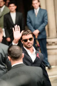 George Michael outside court after losing his battle against Sony. Wearing an AIDS ribbon George Michael outside court after losing his battle against Sony. Wearing an AIDS ribbon
