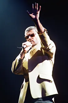 George Michael performing on stage at the Wembley Arena during his Cover to Cover tour George Michael performing on stage at the Wembley Arena during his Cover to Cover tour