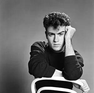 George Michael of the teenage pop duo Wham!, poses in the studio. 26th October 1982 George Michael of the teenage pop duo Wham!, poses in the studio. 26th October 1982