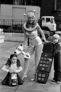 Gillian Duxbury and a large size model of the electronic game 'Merlin' Gillian Duxbury and a large size model of the electronic game 'Merlin'