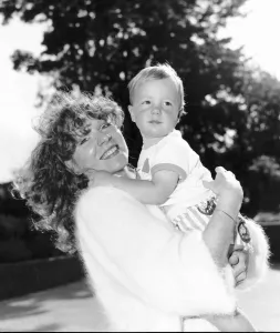 Gilly Coman star in the BBC TV Series Bread carrying her little son Gilly Coman star in the BBC TV Series Bread carrying her little son