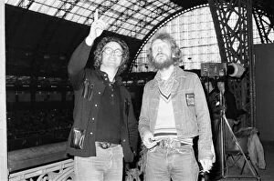 Images Dated 18th December 1975: Ginger Baker (right), Drummer and founder of the rock band Cream, with Mel Bush