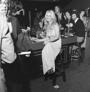 A girl sitting alone at the bar inside the nightclub Slack Alice in Manchester which A girl sitting alone at the bar inside the nightclub Slack Alice in Manchester which