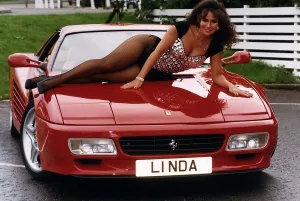 Glamour Mmodel Linda Lusardi sits on the bonnet of Ferrari 512TR. 2nd October 1993 Glamour Mmodel Linda Lusardi sits on the bonnet of Ferrari 512TR. 2nd October 1993