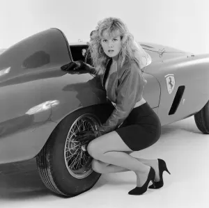 Glamour model Caroline Delahunty poses next to a Ferrari. 19th April 1988 Glamour model Caroline Delahunty poses next to a Ferrari. 19th April 1988