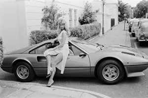 Glamour model Tina poses next to a Ferrari 308 GTB. 11th July 1979 Glamour model Tina poses next to a Ferrari 308 GTB. 11th July 1979
