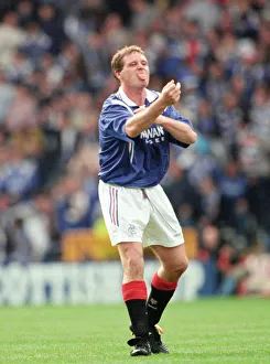 Glasgow Rangers footballer Paul Gascoigne making a one finger gesture while sticking out Glasgow Rangers footballer Paul Gascoigne making a one finger gesture while sticking out