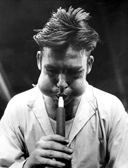 Glass blower Albert Coulson puffs and blows his way through another job in September 1972 Glass blower Albert Coulson puffs and blows his way through another job in September 1972
