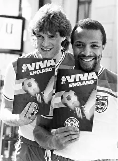 Glenn Hoddle (left) and Cyrille Regis (right) taking time off from preparing for Glenn Hoddle (left) and Cyrille Regis (right) taking time off from preparing for