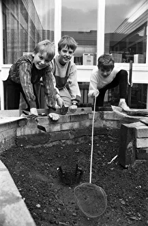 Golcar Junior School pupils are pictured by the pond that they have been working on since Golcar Junior School pupils are pictured by the pond that they have been working on since