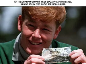 Gordon Sherry golfer holds crumpled five pound note fiver at SPGA ProAm tournament at Gordon Sherry golfer holds crumpled five pound note fiver at SPGA ProAm tournament at