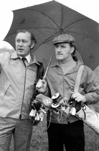 Graham Hill and Larry Webb. January 1975 75-00355 Graham Hill and Larry Webb. January 1975 75-00355