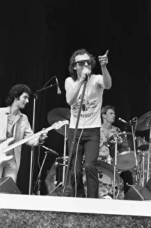 Graham Parker and The Rumour seen here performing on stage at The Picnic pop concert at Graham Parker and The Rumour seen here performing on stage at The Picnic pop concert at