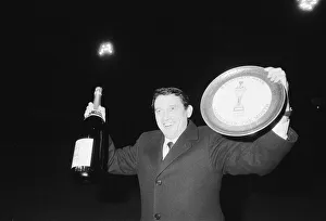 Graham Taylor, Aston Villa manager is presented with a jeroboam of champagne Graham Taylor, Aston Villa manager is presented with a jeroboam of champagne