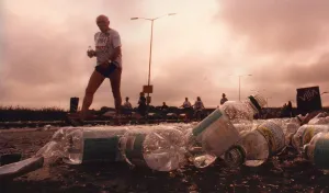 The Great North Run 17 September 1995 - A lone competitor brings up the rearguard as they The Great North Run 17 September 1995 - A lone competitor brings up the rearguard as they