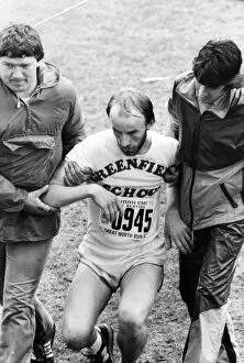 Images Dated 27th June 1982: The Great North Run 27 June 1982 - An exhausted runner is helped by volunteers