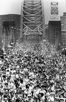 Images Dated 27th June 1982: The Great North Run 27 June 1982 - The runners stream across the Tyne Bridge - A Journal