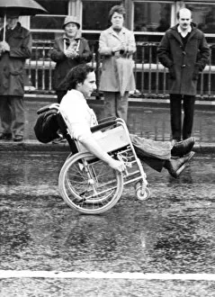 Images Dated 27th June 1982: The Great North Run 27 June 1982 - A wheelchair competitor does a wheelie across the Tyne