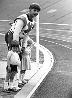 Green Cross Code man Dave Prowse gives some local youngsters a hand crossing the track Green Cross Code man Dave Prowse gives some local youngsters a hand crossing the track