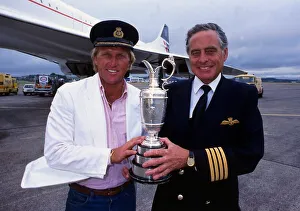 Greg Norman holds the Claret Jug trophy after winning the British Open with Concorde Greg Norman holds the Claret Jug trophy after winning the British Open with Concorde