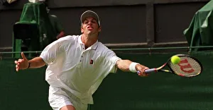 GREG RUSEDSKI IN ACTION AGAINST DANIEL NESTOR WIMBLEDON TENNIS CHAMPIONSHIPS GREG RUSEDSKI IN ACTION AGAINST DANIEL NESTOR WIMBLEDON TENNIS CHAMPIONSHIPS