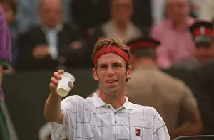 GREG RUSEDSKI TAKES A BREAK DURING HIS GAME WITH PETE SAMPRAS AT THE 1995 GREG RUSEDSKI TAKES A BREAK DURING HIS GAME WITH PETE SAMPRAS AT THE 1995
