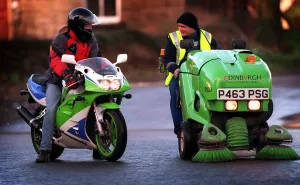 Greg Walker on green motorbike and Stuart Harden with his green machine road cleaner for Greg Walker on green motorbike and Stuart Harden with his green machine road cleaner for