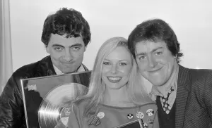 Griff Rhys Jones with fellow comedians Rowan Atkinson and Pamela Stephenson all receiving Griff Rhys Jones with fellow comedians Rowan Atkinson and Pamela Stephenson all receiving