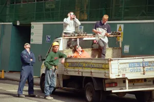A group of workmen in Liverpool city centre watching the solar eclipse. 11th August 1999 A group of workmen in Liverpool city centre watching the solar eclipse. 11th August 1999