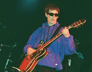 Guitarist with pop group Nowaysis Oasis tribute band at T in the Park on stage in NME Guitarist with pop group Nowaysis Oasis tribute band at T in the Park on stage in NME